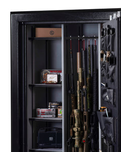 The Winchester Legacy 62 by Winchester Safe features an open interior with neatly organized firearms, ammo, and accessories on shelves and door pockets, offering ample storage and robust fire protection for peace of mind.